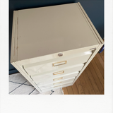 Metal piece of furniture with valves