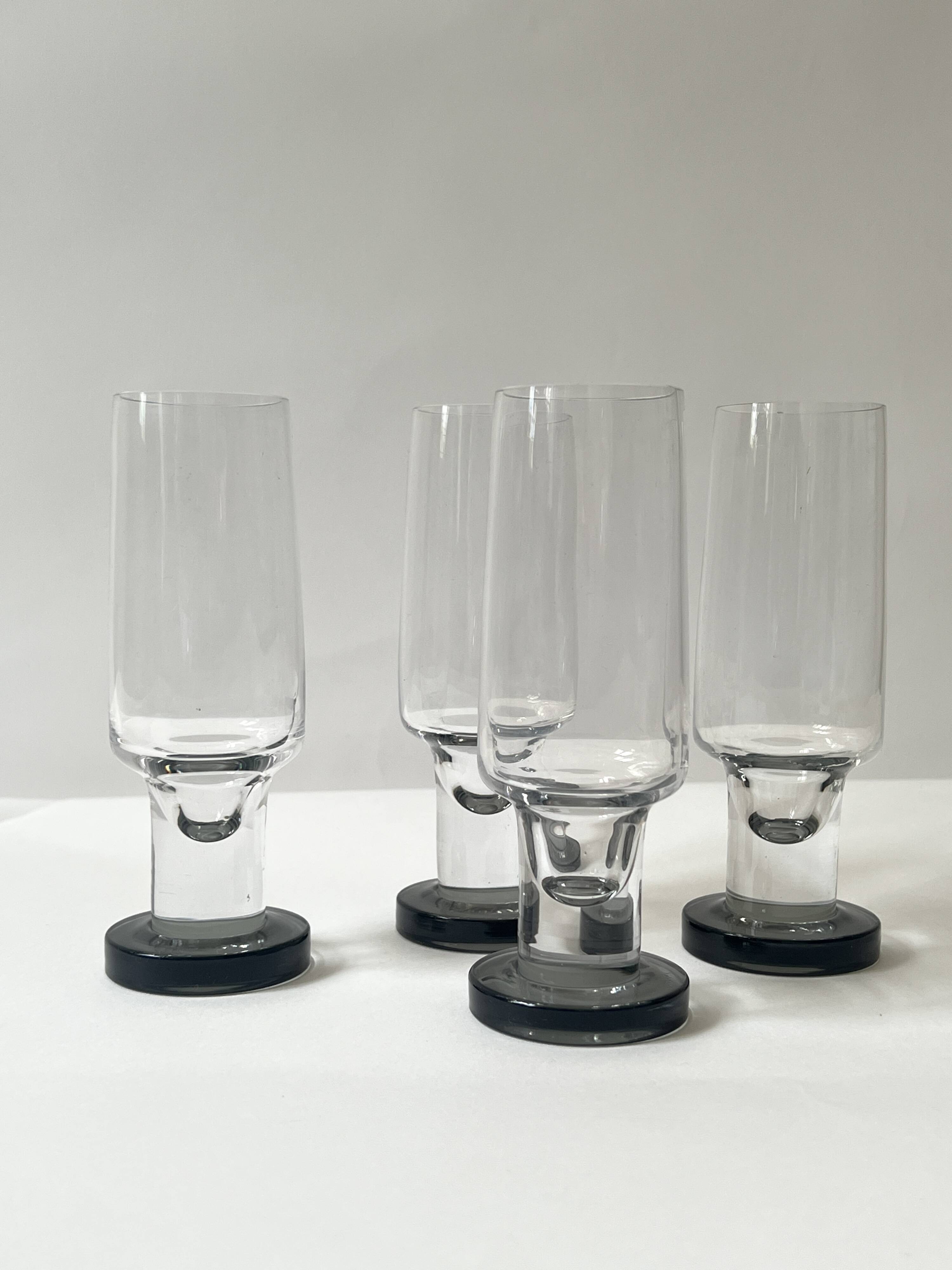 Set of 4 black crystal wine/champagne glasses, French, circa 1970.