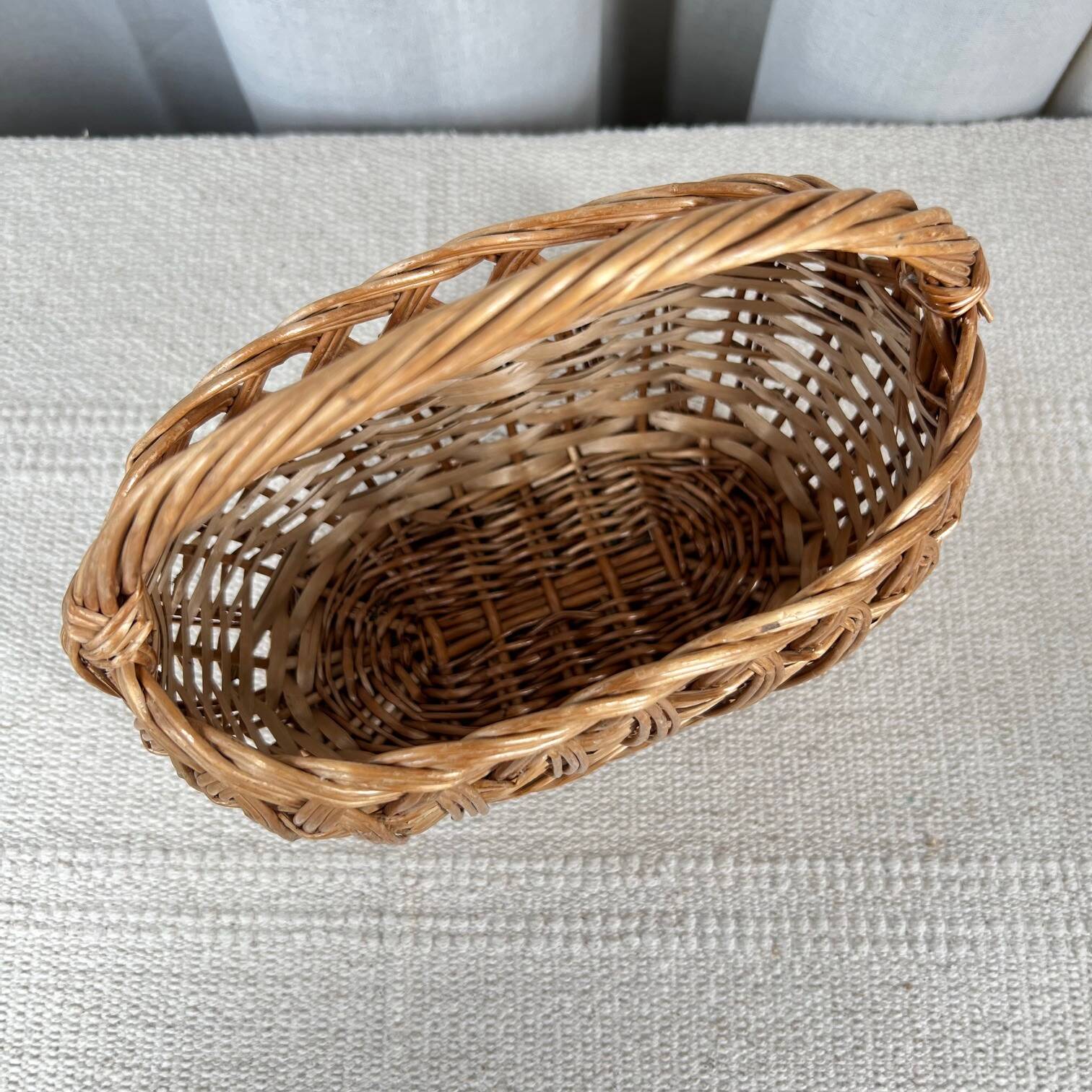 Small oval woven wicker basket