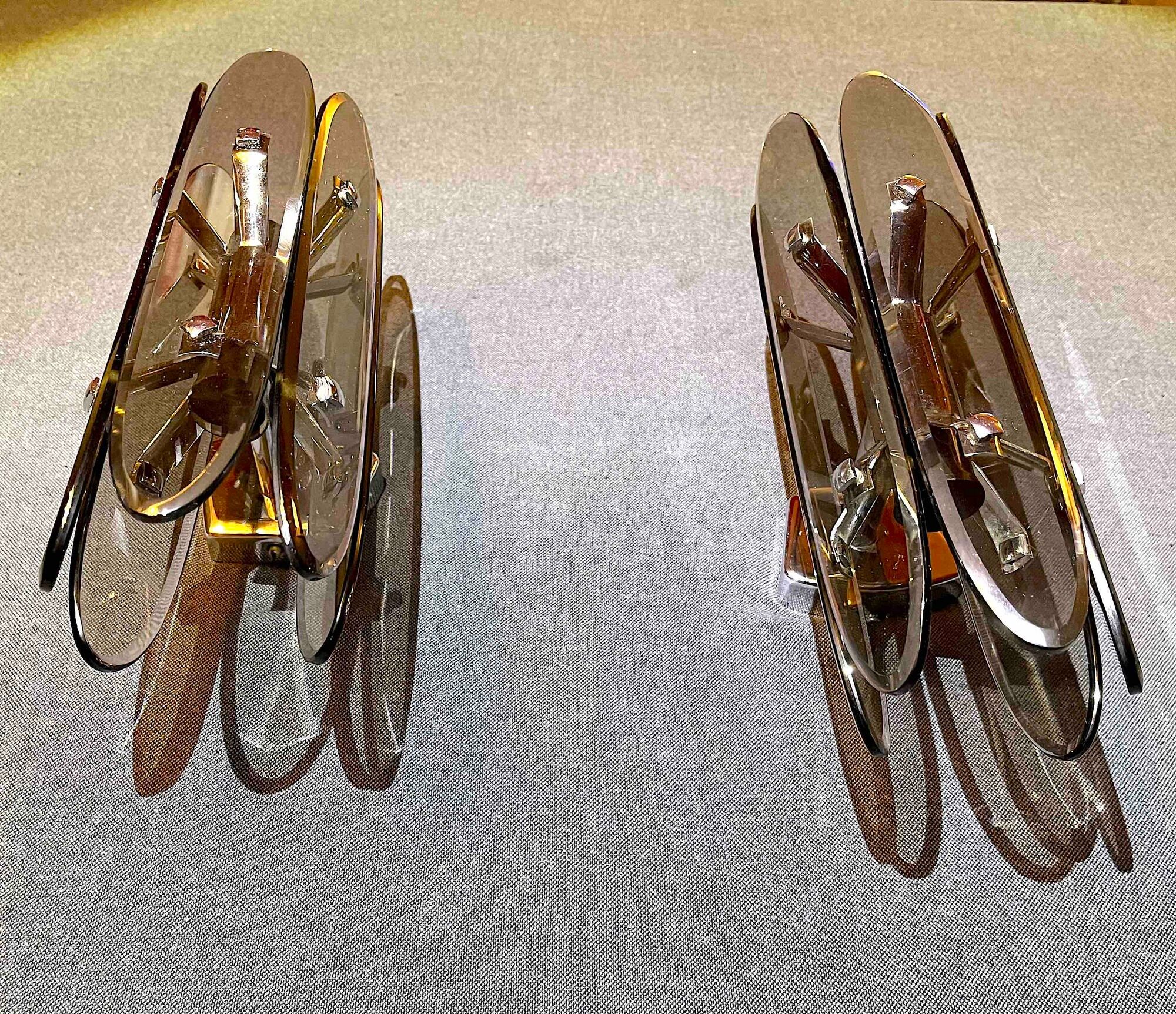 Pair of Italian wall lamp in glass and chrome, 1970's