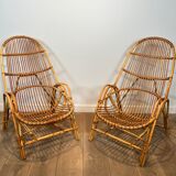 Pair of designer armchairs in rattan