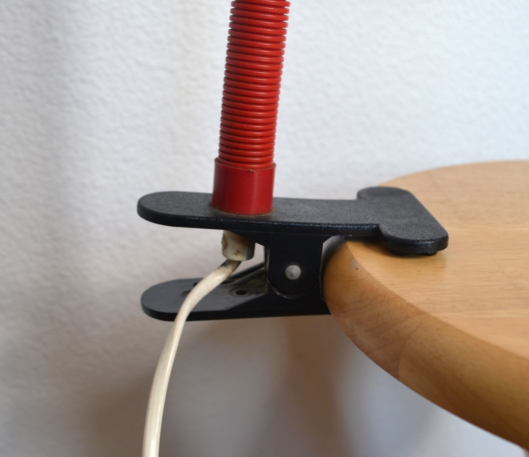 Red articulated clip-on desk lamp vintage