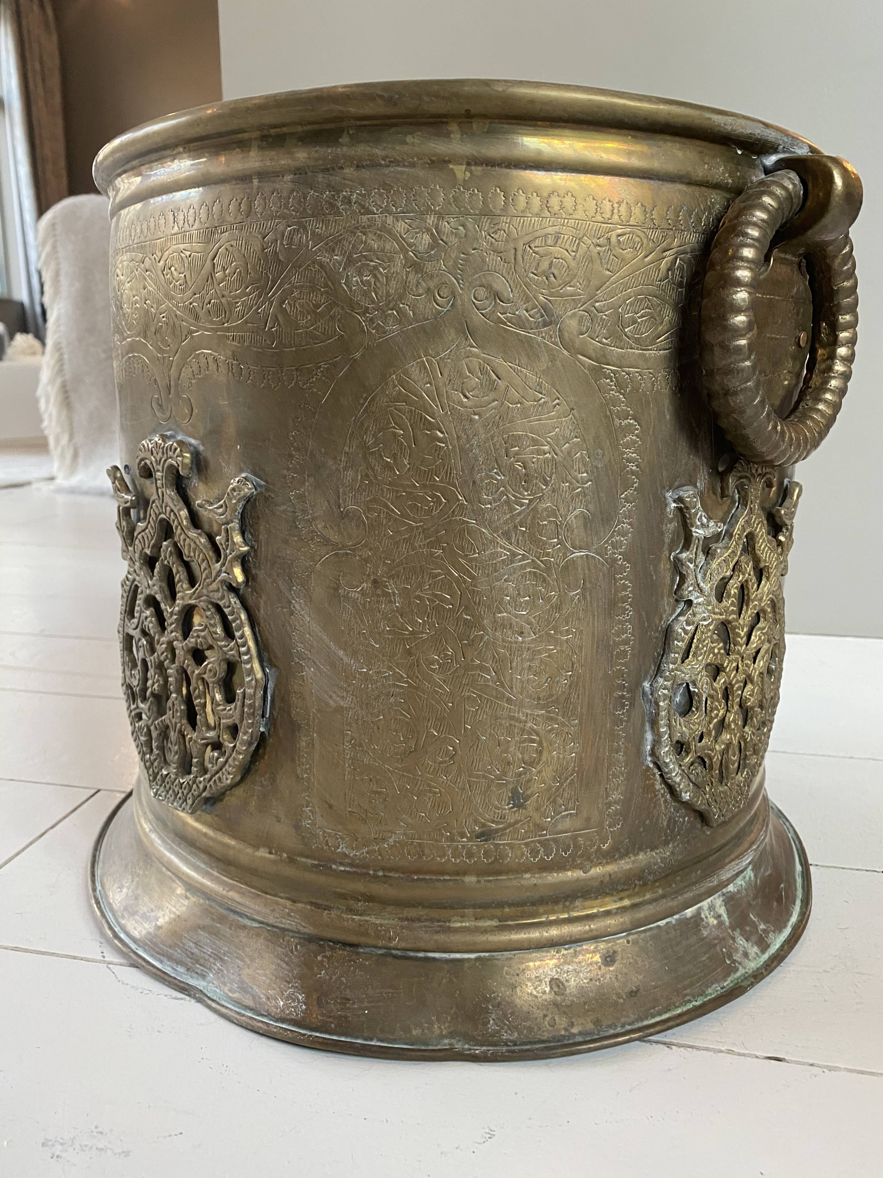 Engraved brass pot cover