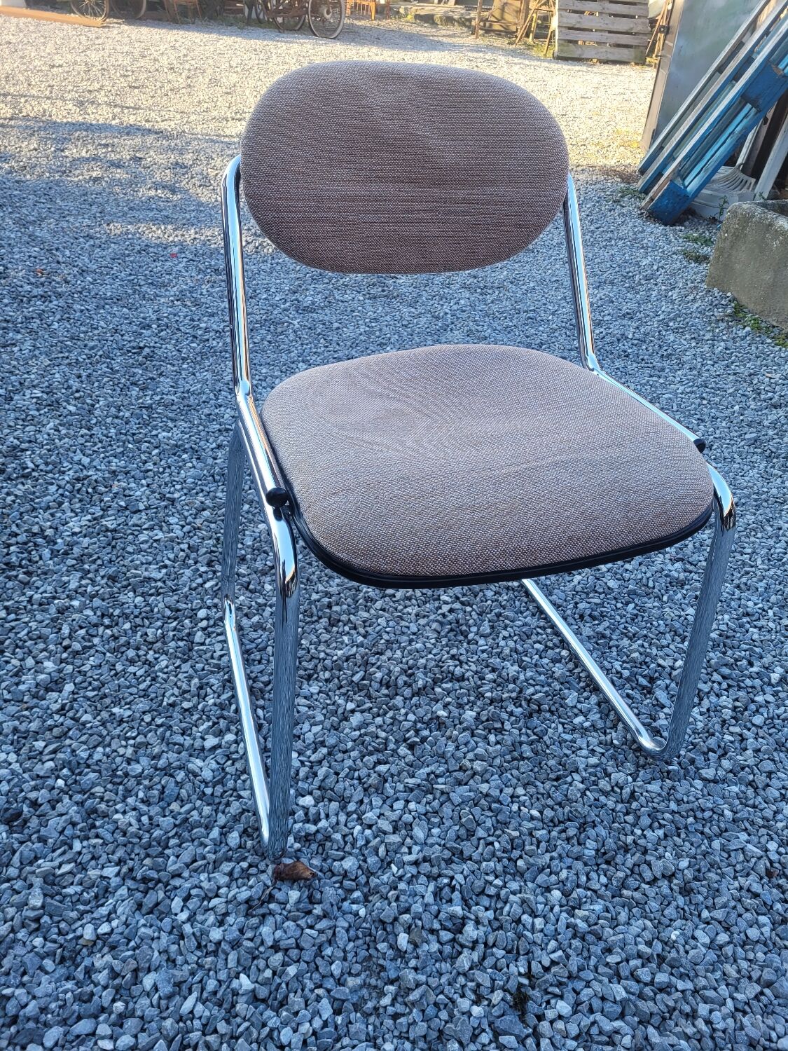 Vintage office chair with chrome base and fabric top