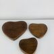 Set of 3 Scandinavian teak empty pockets in heart shape.