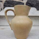 Beige ceramic pitcher