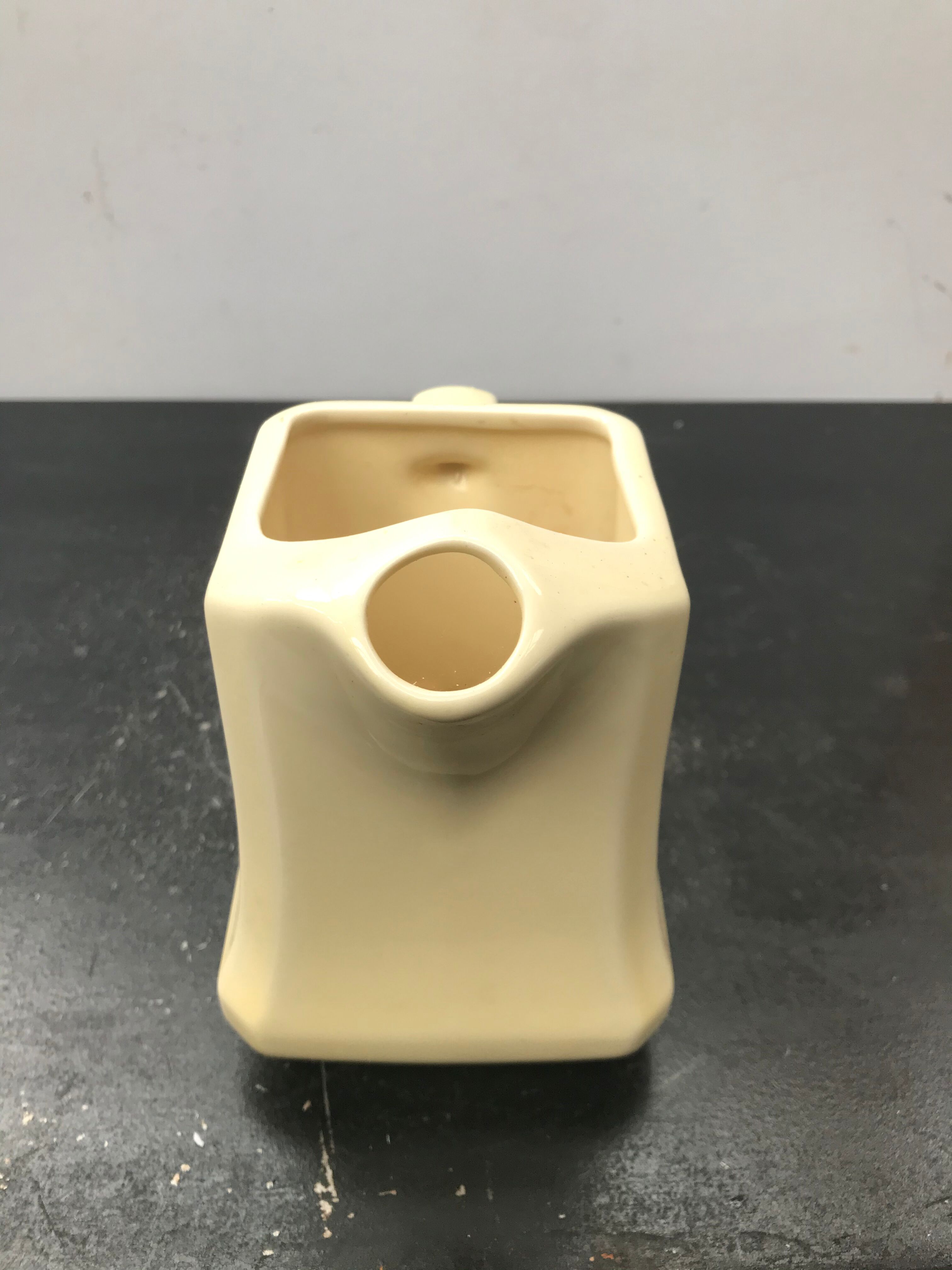 Former beige ceramic pitcher 70