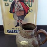 Brown stoneware pitcher