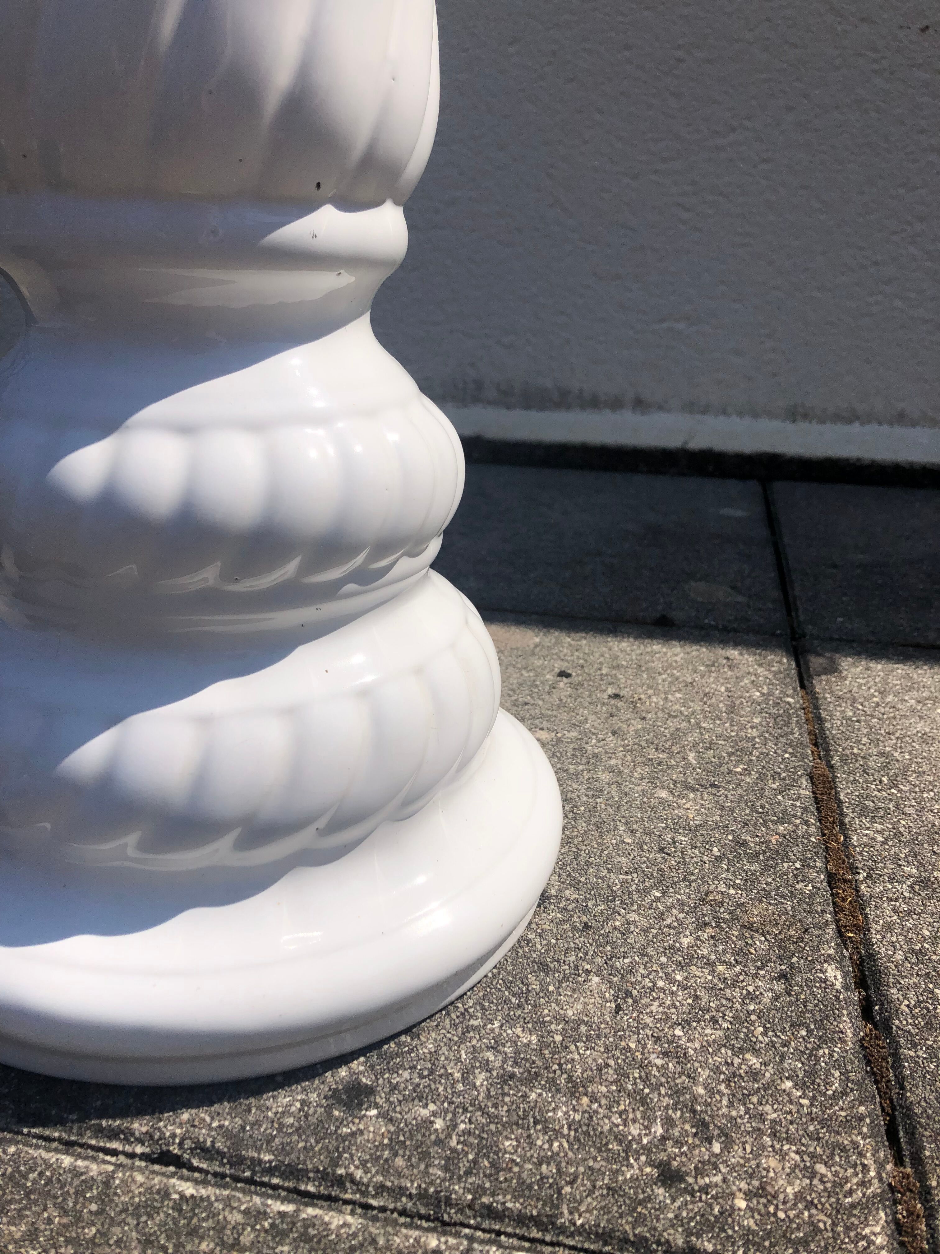 Column and white earthenware pot cover