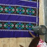 Romanian rug handwoven in wool, purple background with red and yellow stripes