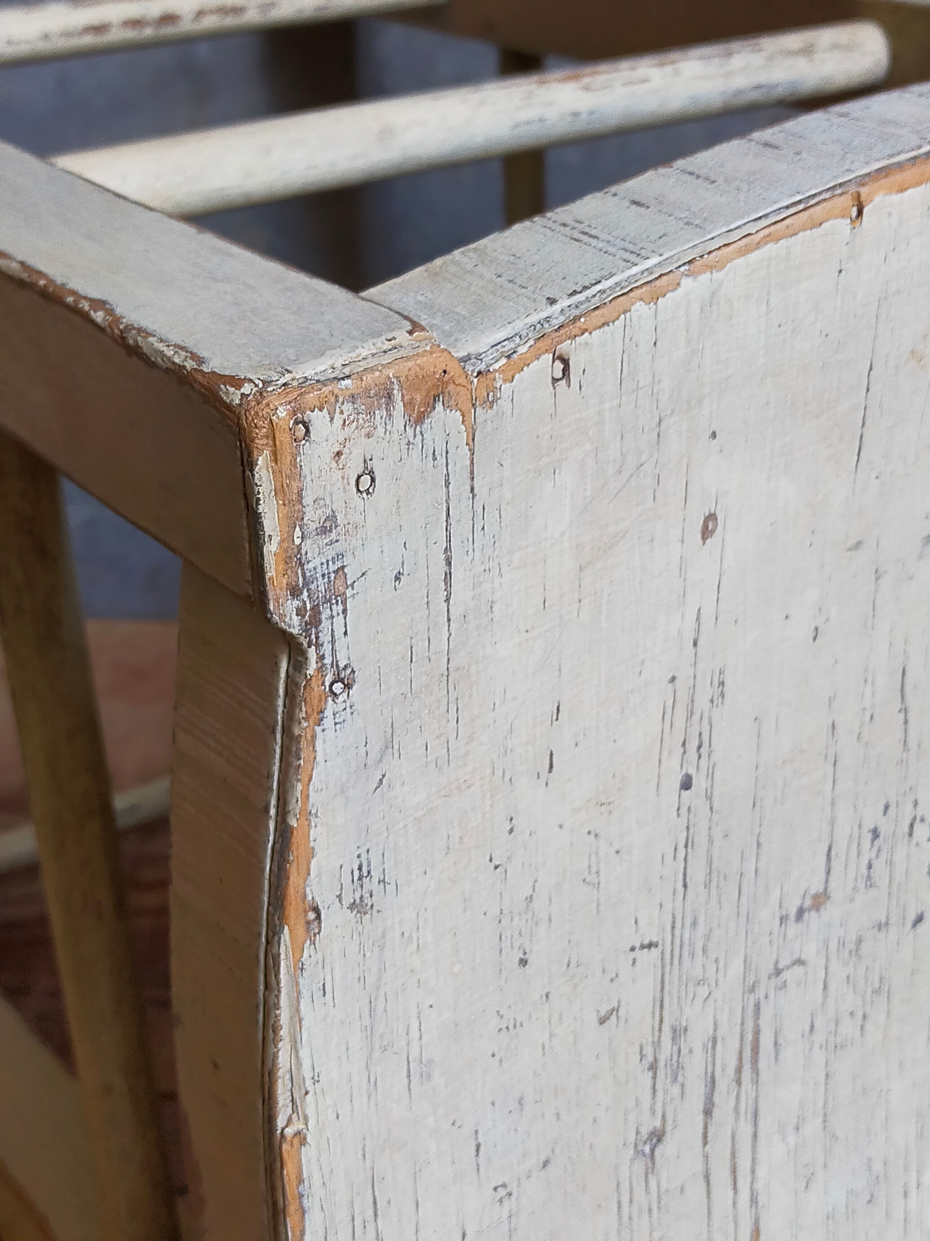 Old patinated painted wooden stool