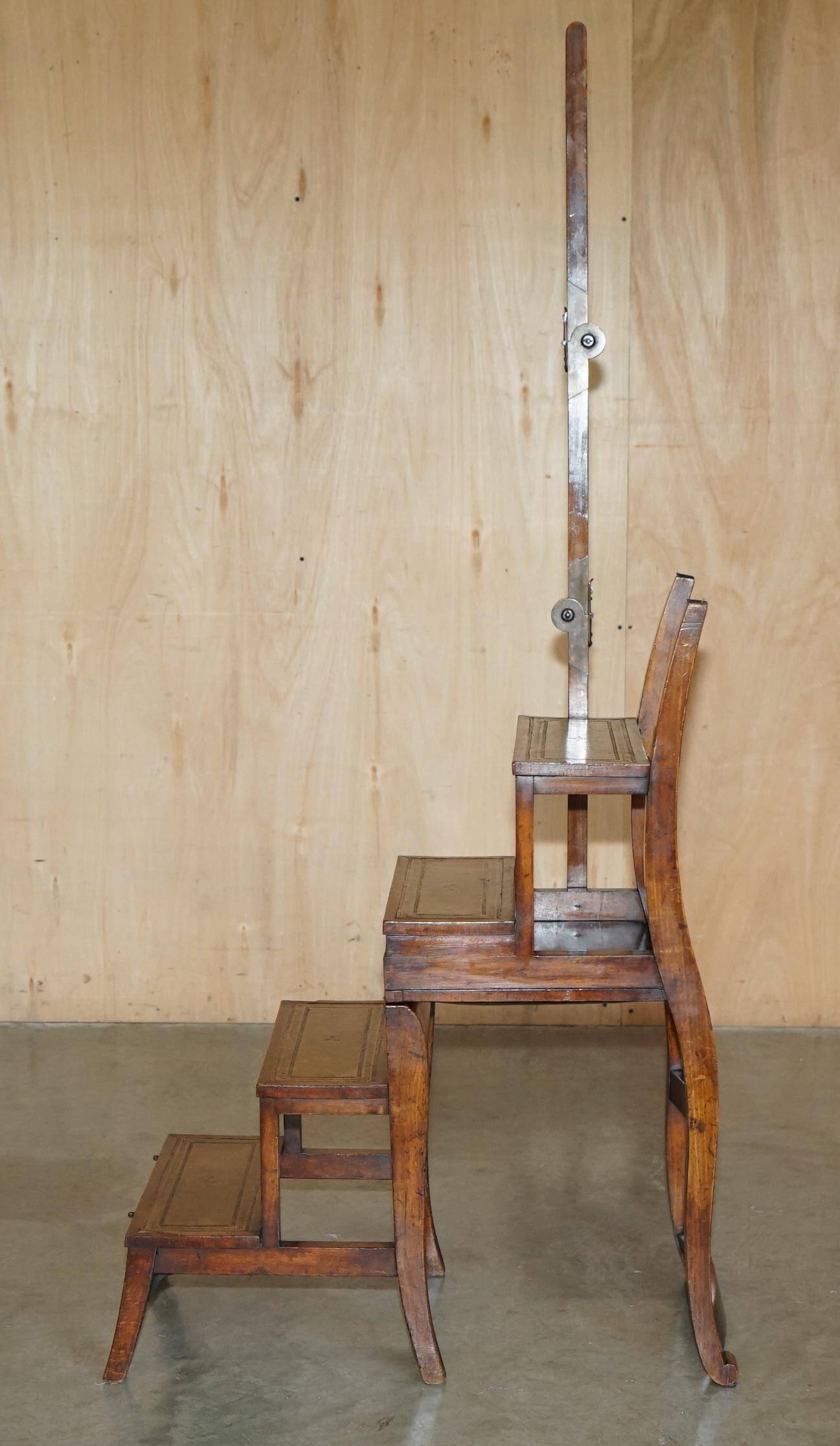 Victorian library chair, convertible, hardwood, leather, brass, circa 1880.