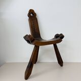 Brutalist hand carved oak Spanish tripod chair , 1970s