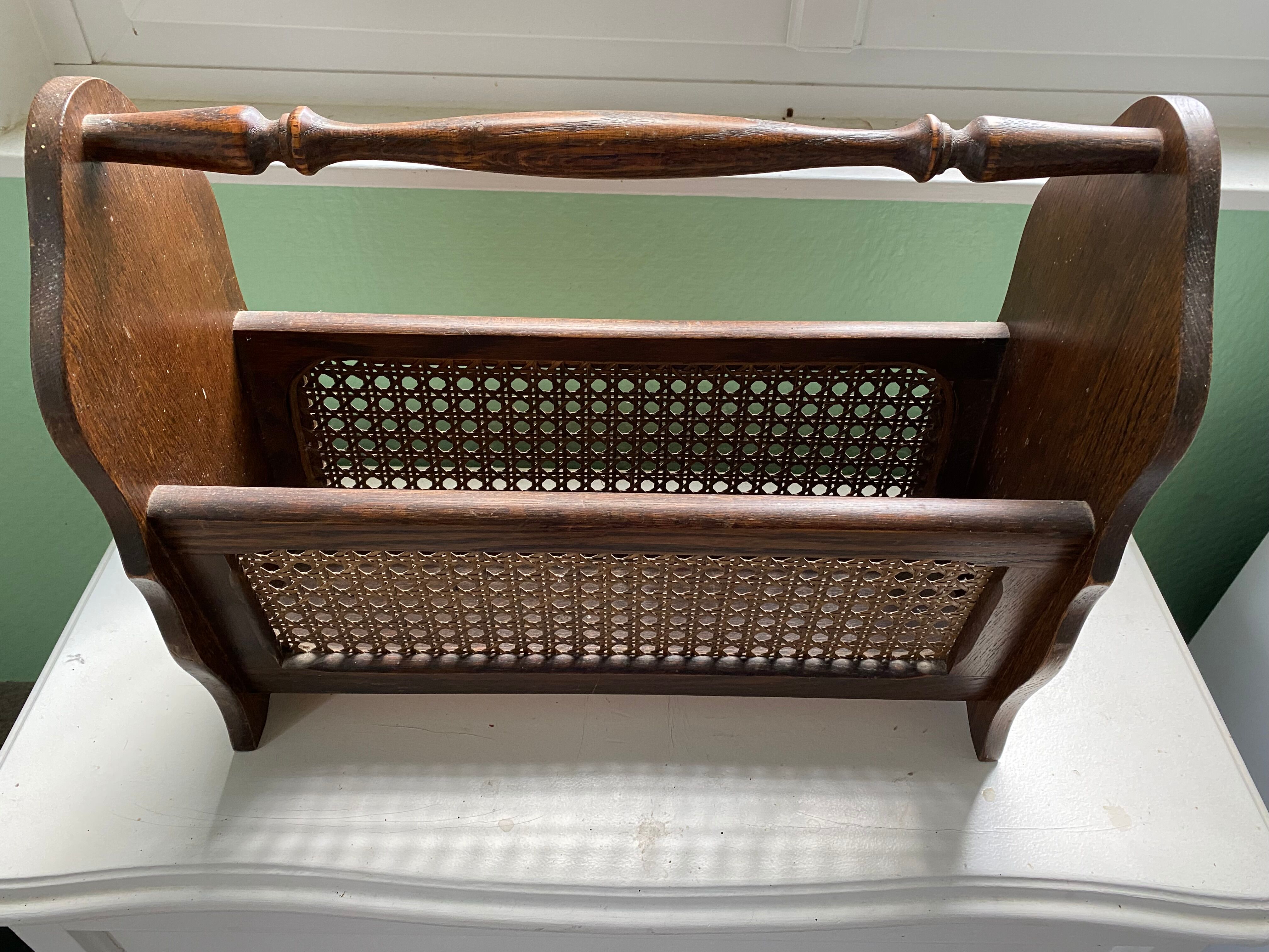 Wooden and cane newspaper rack