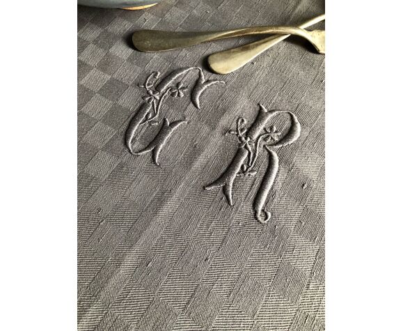 Old tablecloth tinted in zinc gray