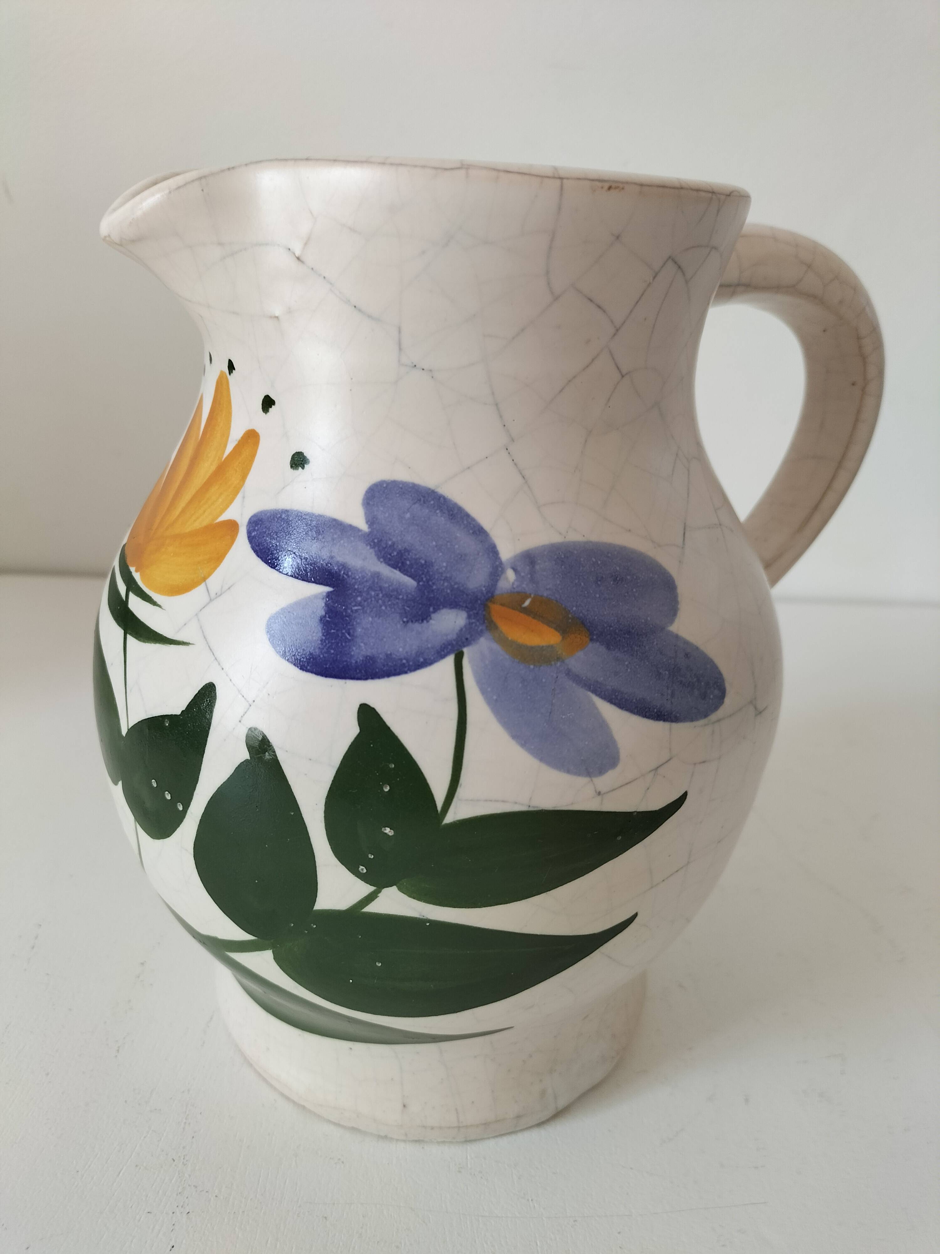 Vintage pitcher with floral decoration in the style of Poterie du Marais