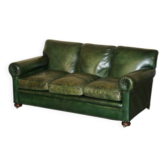 Victorian leather canapé, shield armrests, stamped Maple & Co.