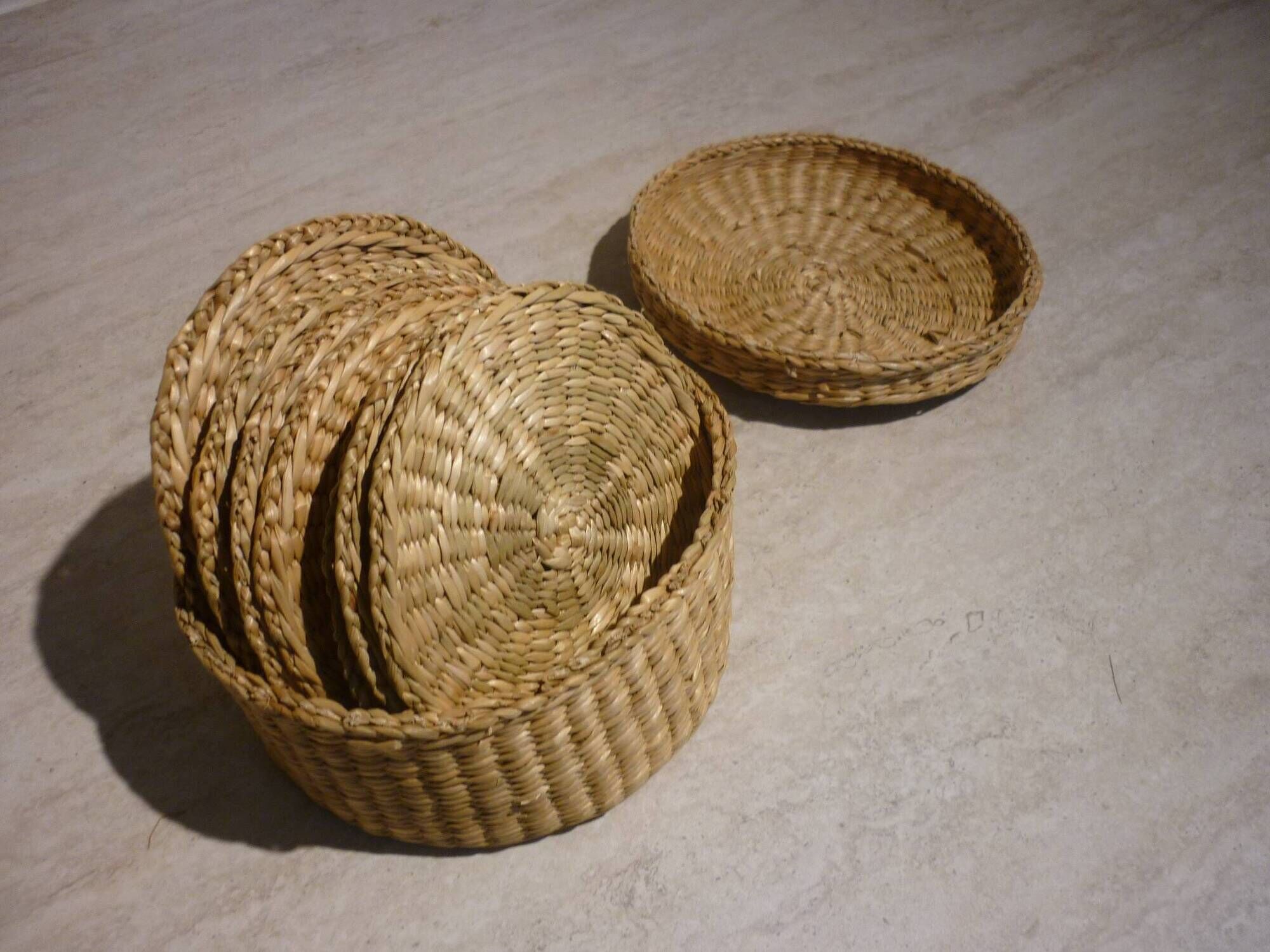 10 coasters in their wicker box