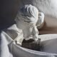 Plaster bust on a pedestal