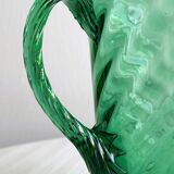 Green blown glass pitcher, unique twisted design