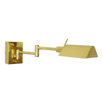 Wall light with articulated and adjustable arms in gold metal. Wall light painting. 80s