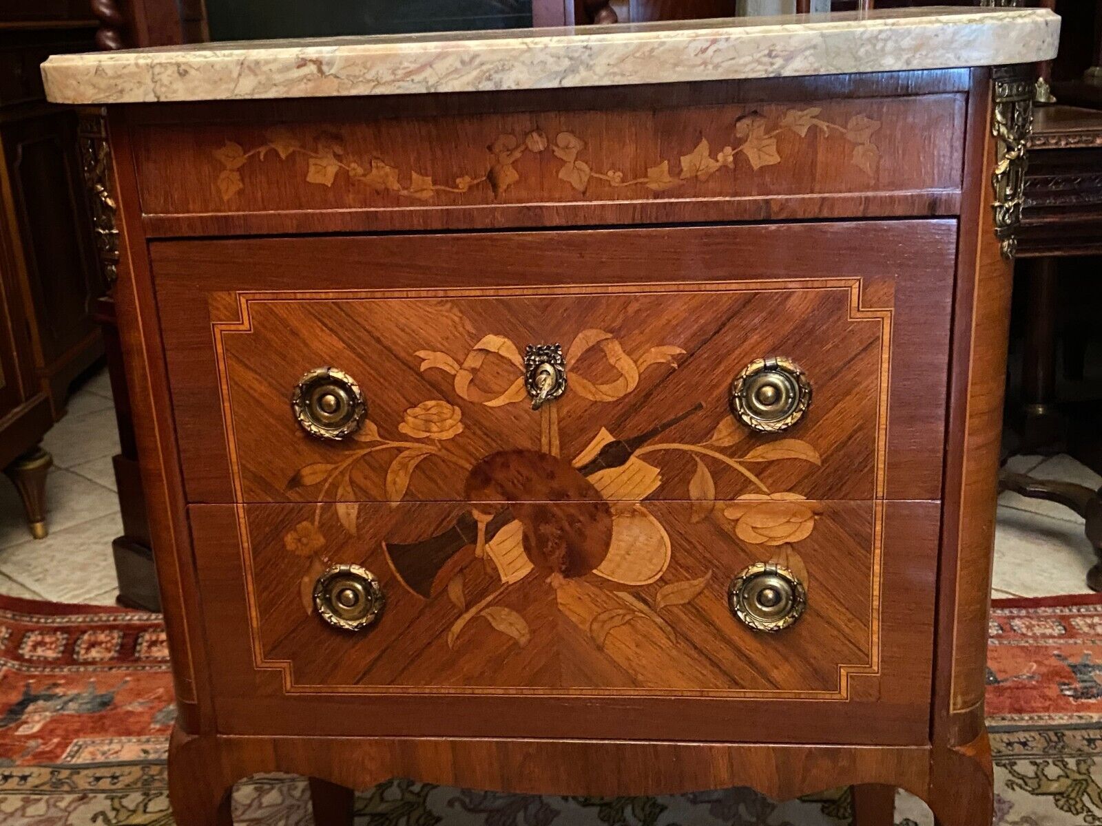 Louis XV Louis XVI style inlaid chest of drawers