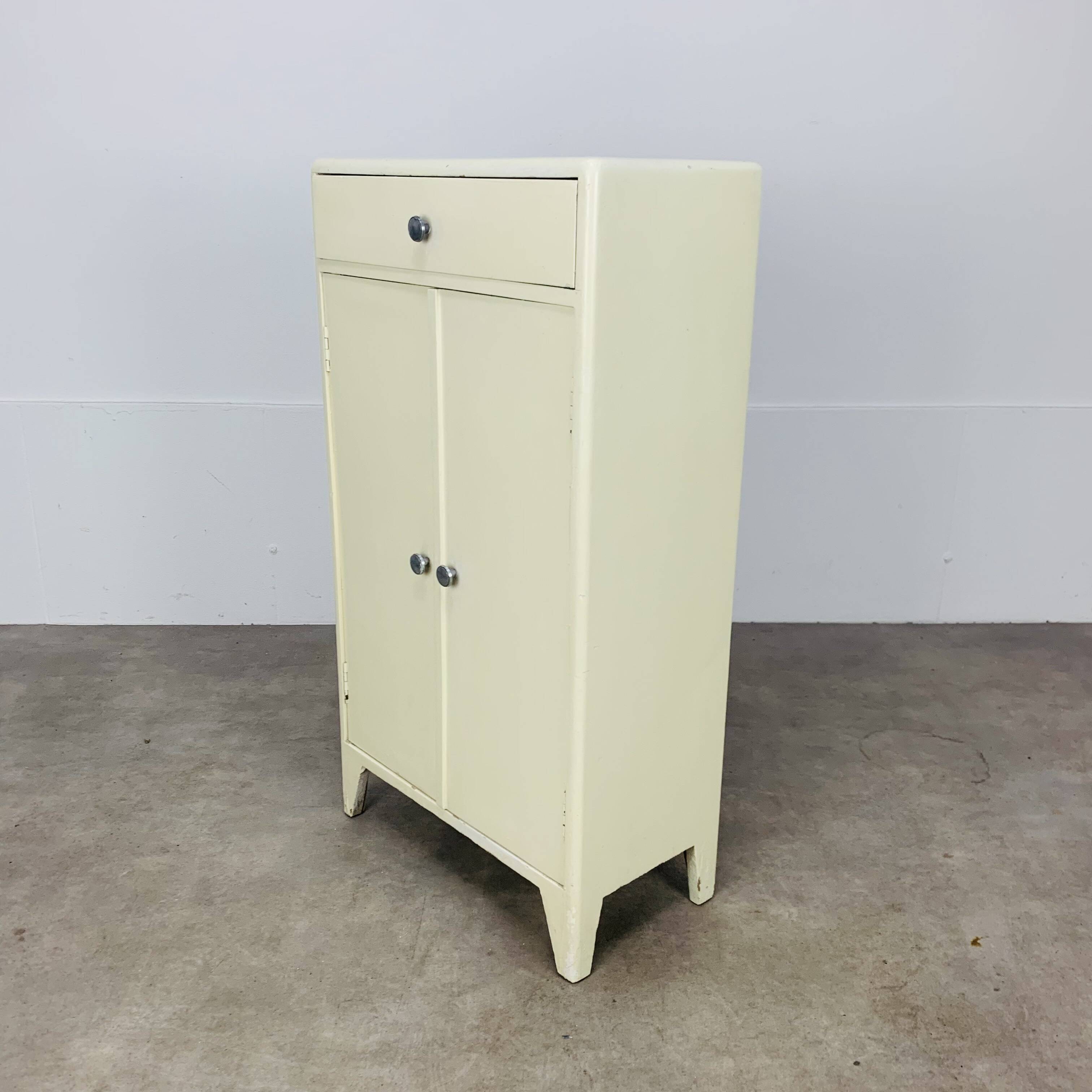 White wood convenient storage unit from the 1950s