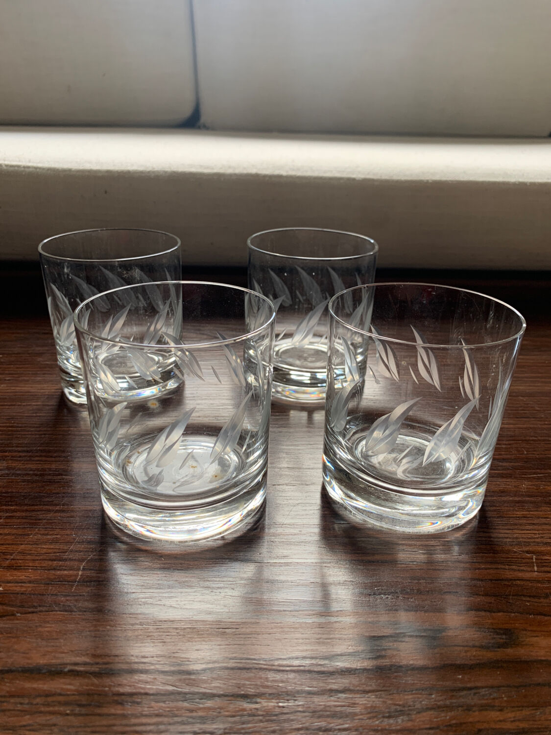 Four whisky glasses