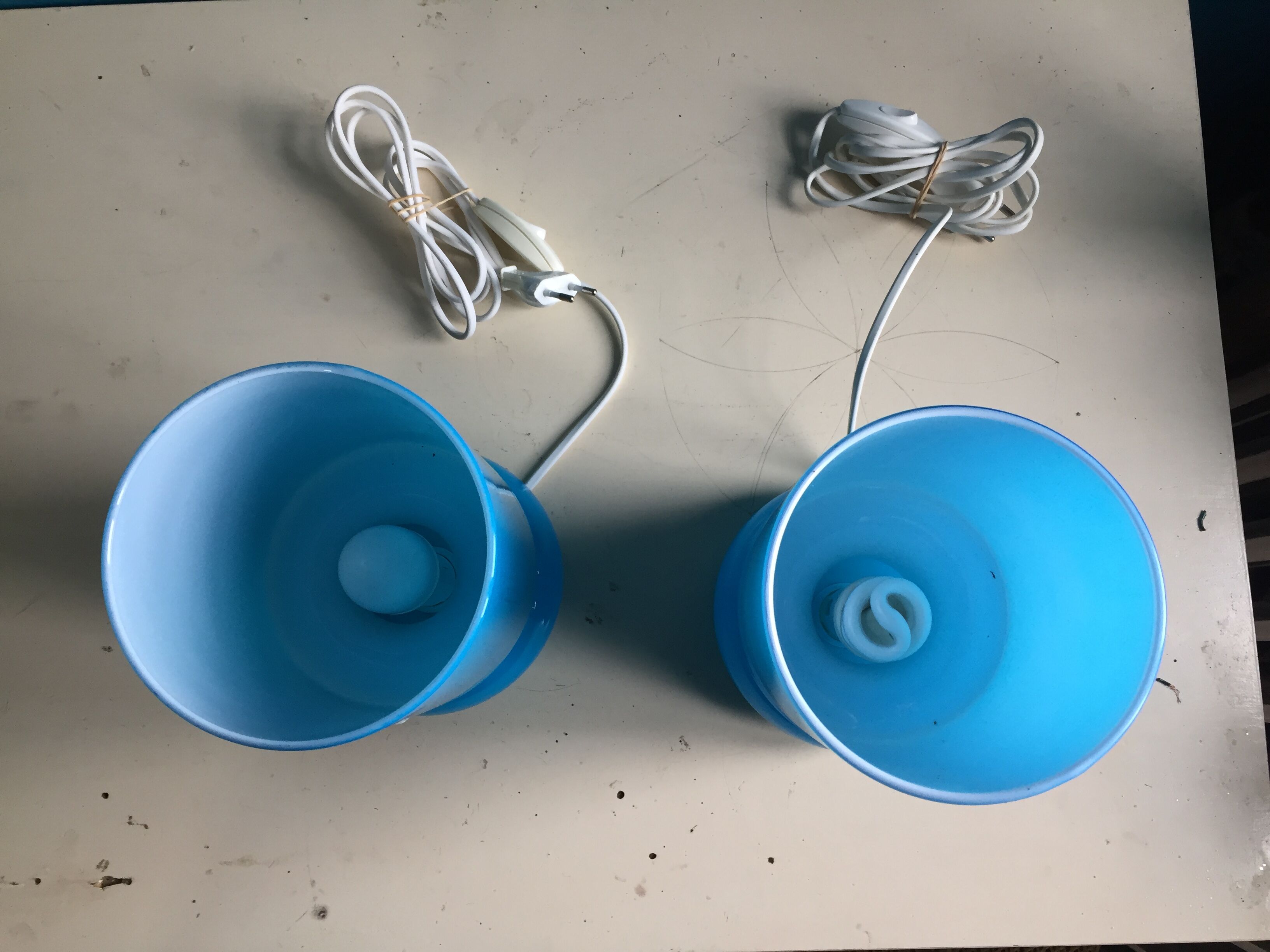 Two handmade IKEA 1980 blue glass candy lamps