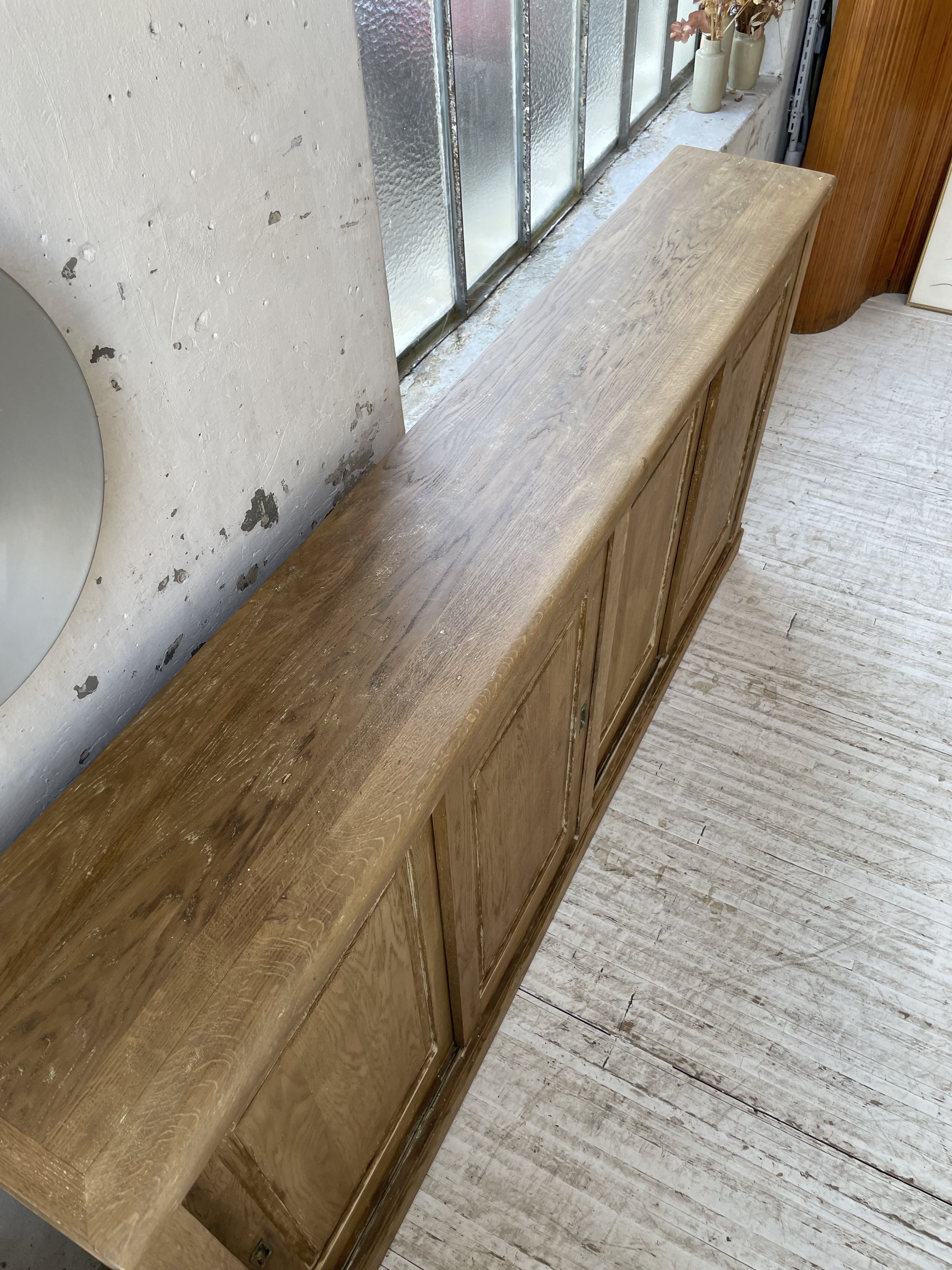 Large row of solid oak loom sliding doors