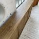Large row of solid oak loom sliding doors