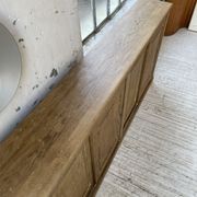 Large row of solid oak loom sliding doors