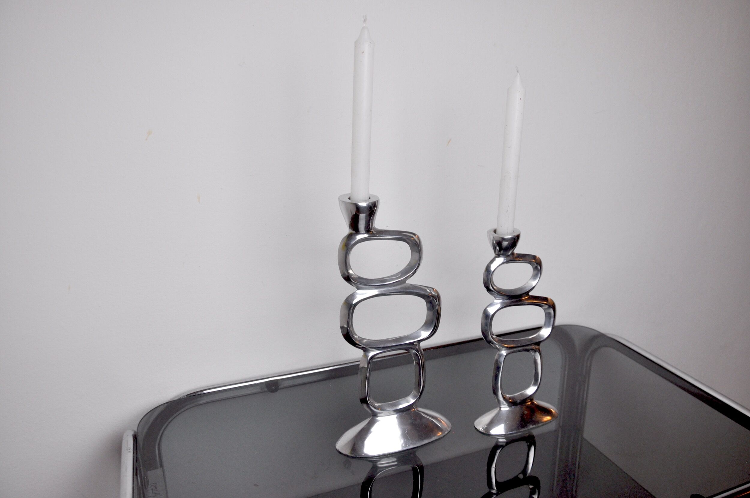 Pair of circle candlesticks by Matthew Hilton, England, 1980