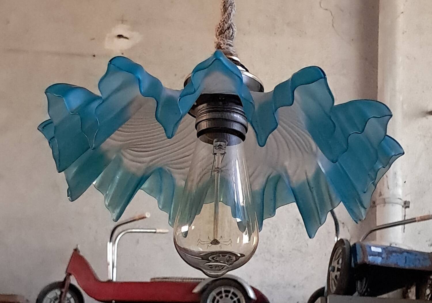 Blue draped suspension