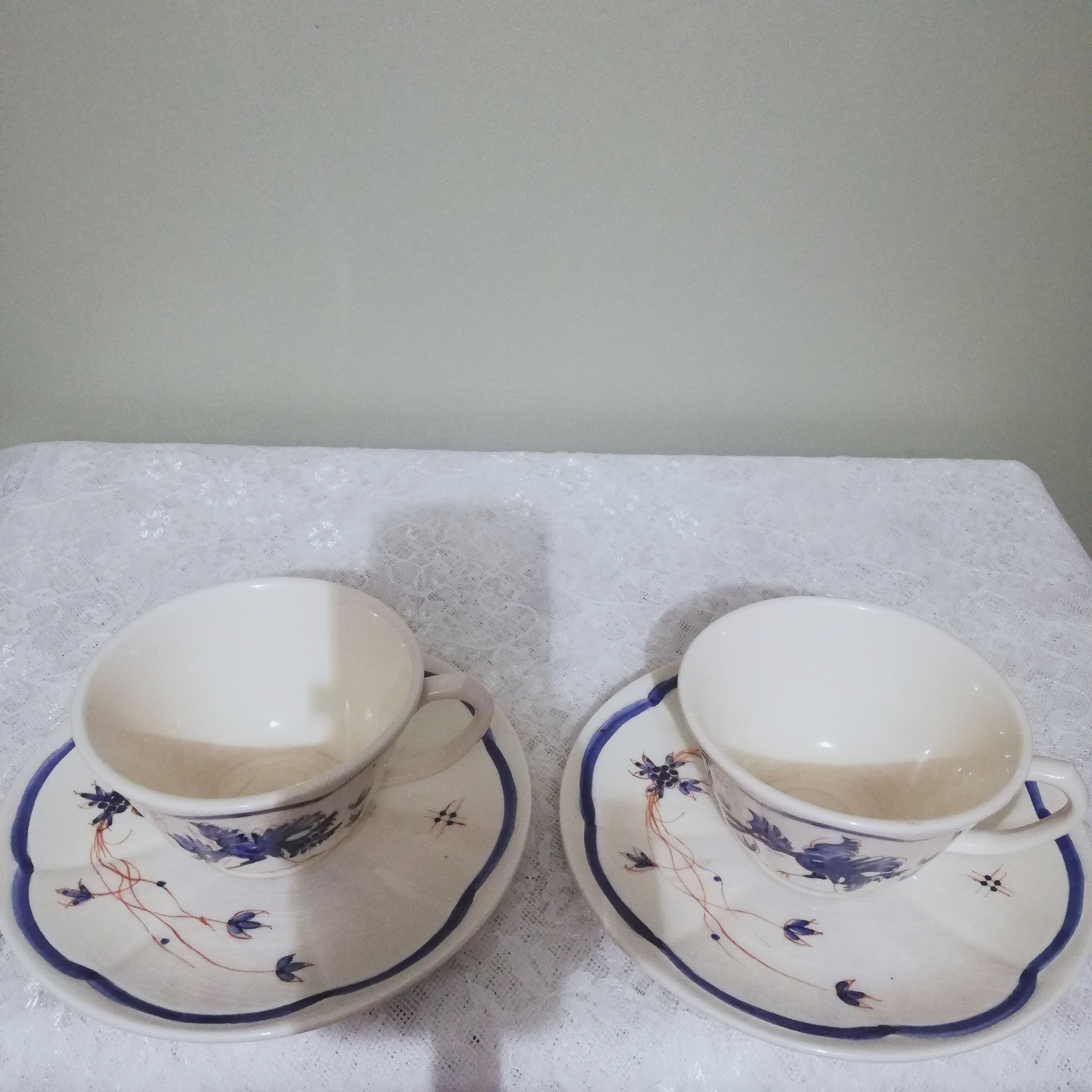 Two ceramic cups by Grignan signed Peguet