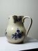 Fine earthenware pitcher with blue decoration, attributed to Saint-Uze, 19th century.