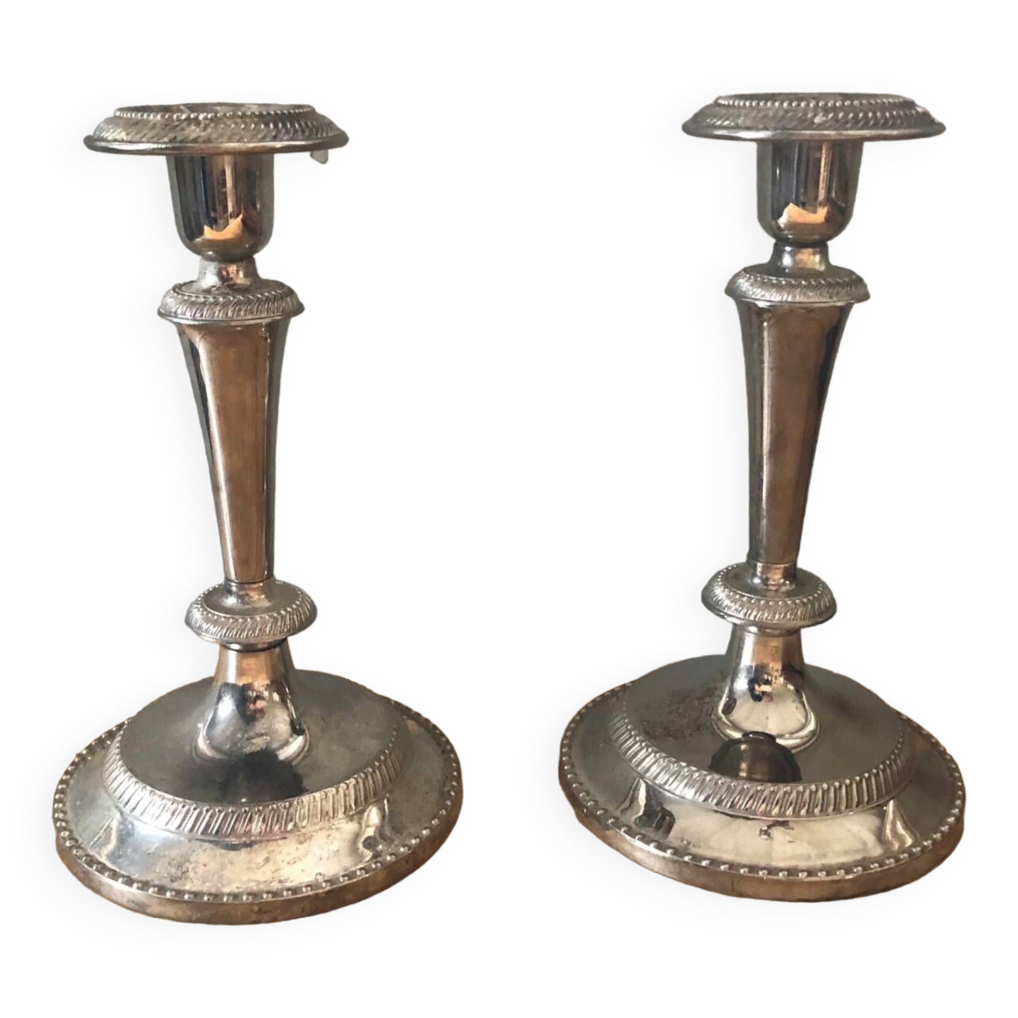 Silver metal candle holders that can be paired.