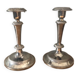 Silver metal candle holders that can be paired.