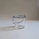 Clear glass ice bucket with an etched floral design