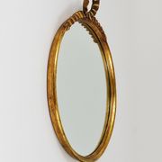 Round wall mirror in gilded wood, mid-century, C. Allodi & G. Subelli, Italy, 1950s.