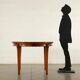 Table in solid beech, mahogany veneer and glass, Italy, 1950s.