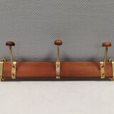 Danish teak and brass coat rack with adjustable hooks, 1960s.