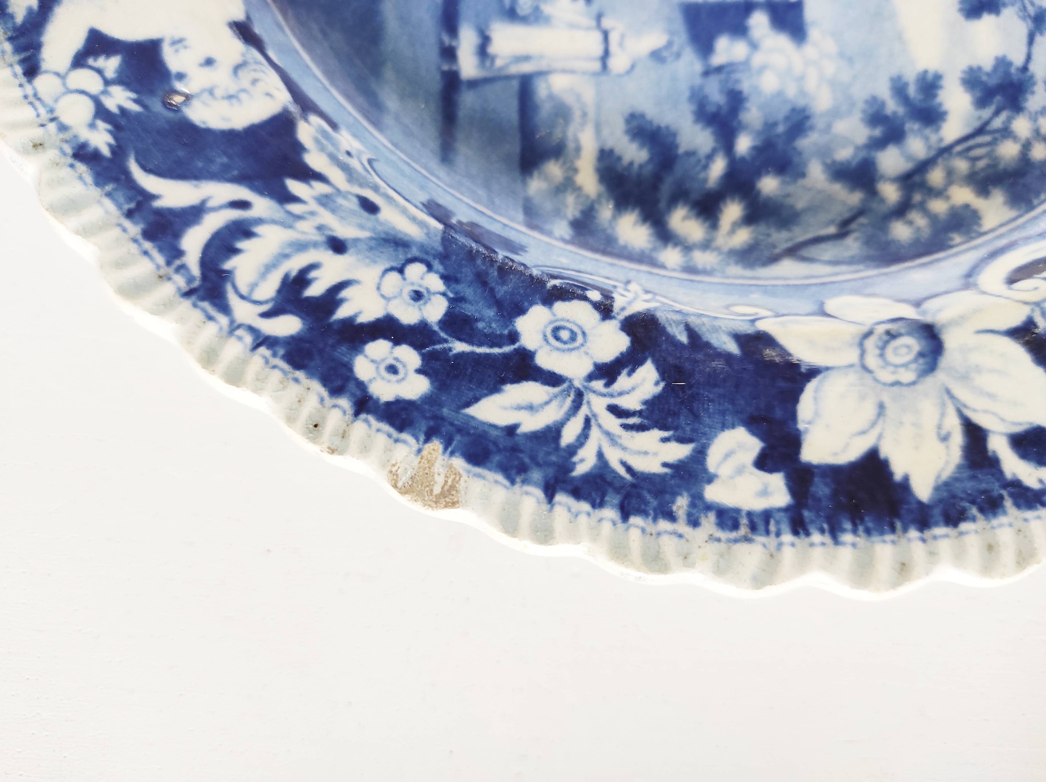 Five 19th century Calais earthenware plates with a romantic gallant couple decor