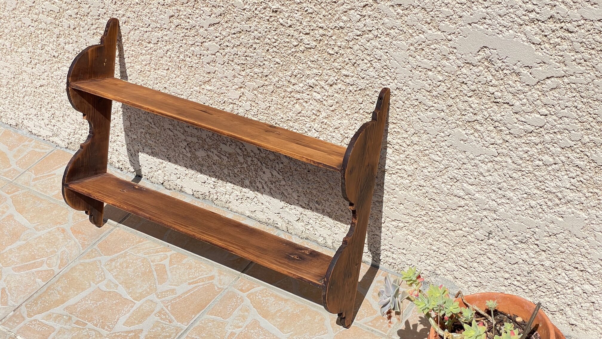 Old wall shelf in wood