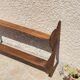 Old wall shelf in wood