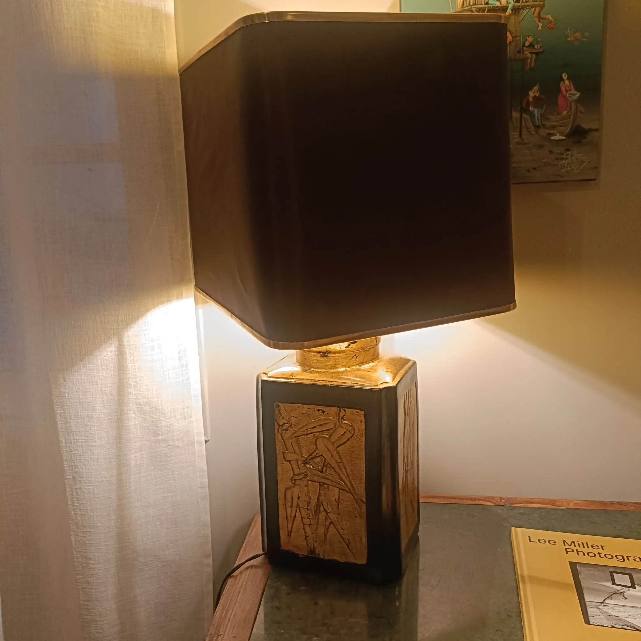 Large ceramic lamp with an Asian theme.