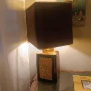 Large ceramic lamp with an Asian theme.