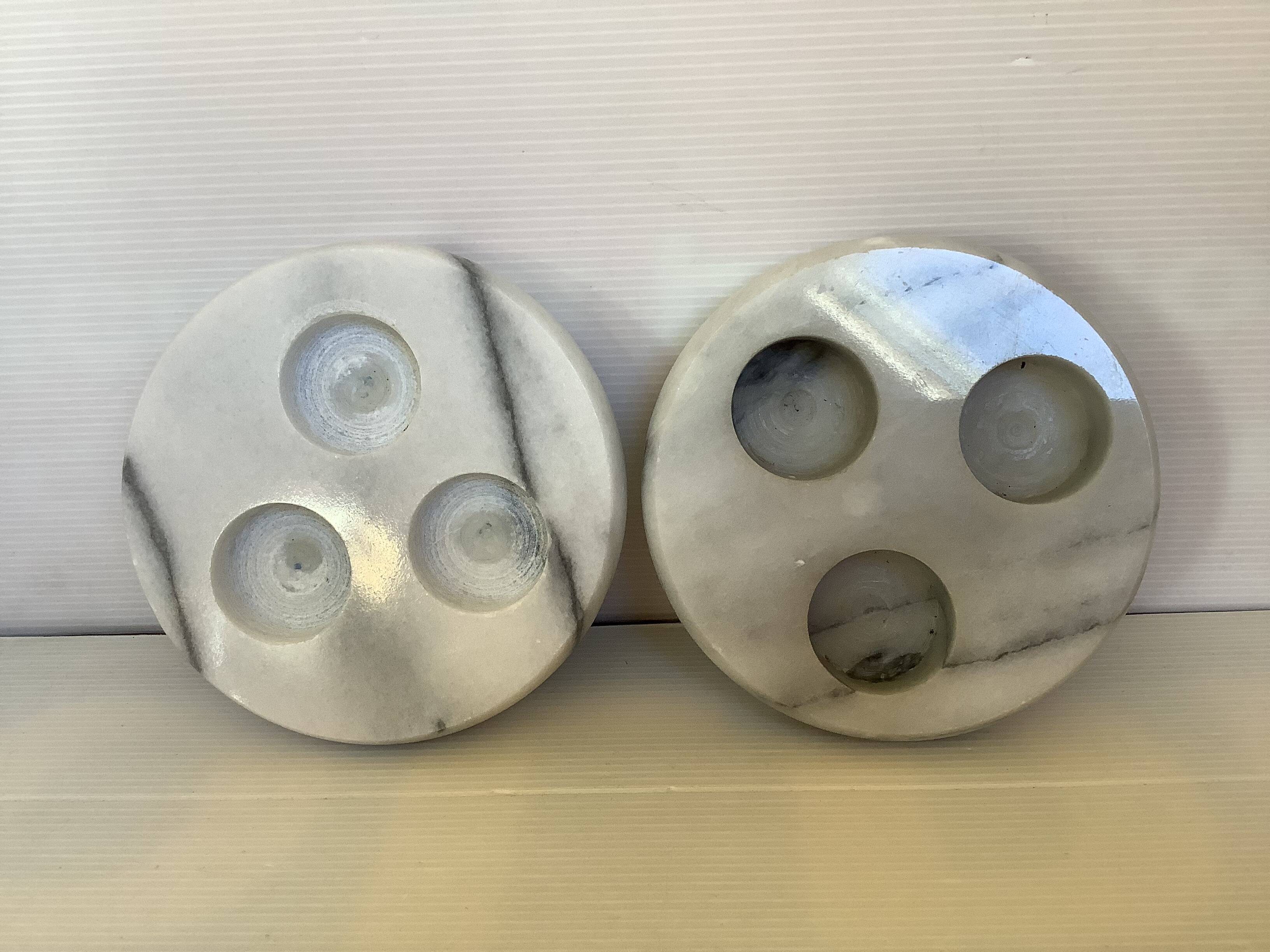 Pair of white and grey marble candlesticks