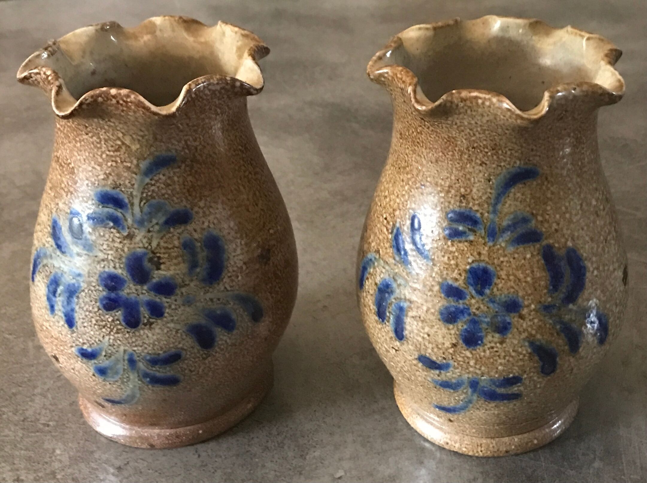 Pair of vintage pottery vases with floral decoration and glaçureau sel