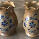 Pair of vintage pottery vases with floral decoration and glaçureau sel